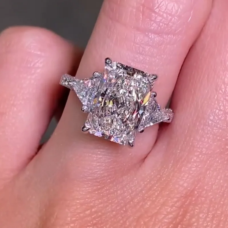 Radiant geslepen Diamantwit sterling zilver 3-steen verlovingsring